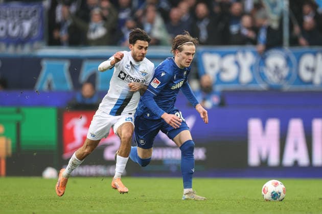 Lucas Copado SC Paderborn 07, 28 in duel with David Herold Karlsruher SC, 20 , Karlsruher SC vs SC Paderborn 07, 2 Bundesliga, Matchday 16, 2025 2026, 13 12 2025, DFL REGULATES PROHIBIT ANY USE OF PHOTOGRAPHS AS IMAGE SEQUENCES AND OR QUASI VIDEO, Karlsruher SC vs SC Paderborn 07, 2 Bundesliga, Matchday 16, 2025 2026, 13 12 2025 Karlsruhe Copyright: xEibner-Pressefoto JanxPrihodax EP_JPA