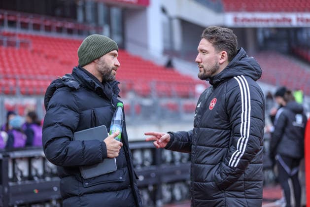 GER, Nuremberg, 1 FC Nuremberg vs VfL Wolfsburg, Google Pixel Bundesliga, Football, DFB, Season 2025 2026, Max Morlock Stadium, 13 Matchday in the picture from l Stephan Lerch Coach Vfl Wolfsburg , Thomas Oostendorp Coach FC Nuremberg Women in conversation DFB DFL REGULATIONS PROHIBIT ANY USE OF PHOTOGRAPHS AS IMAGE SEQUENCES AND OR QUASI VIDEO, 13 12 2025 Copyright: HMBxMedia HendrikxHamelau