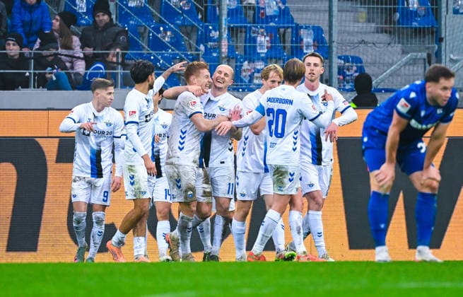 Laurin Curda SC Paderborn celebrates his goal with Sven Michel SC Paderborn and his teammates during the 2 Bundesliga match between Karlsruher SC and SC Paderborn at BBBank Wildpark on December 13, 2025 in Karlsruhe, Germany Photo by Silas Schüller DeFodi Images Laurin Curda SC Paderborn celebrates his goal with Sven Michel SC Paderborn and his teammates during the 2 Bundesliga match between Karlsruher SC and SC Paderborn at BBBank Wildpark on December 13, 2025 in Karlsruhe, Germany Photo by Silas Schüller DeFodi Images DFB DFL REGULATIONS PROHIBIT ANY USE OF PHOTOGRAPHS AS IMAGE SEQUENCES AND OR QUASI VIDEO Photo by Silas Schueller DeFodi Images