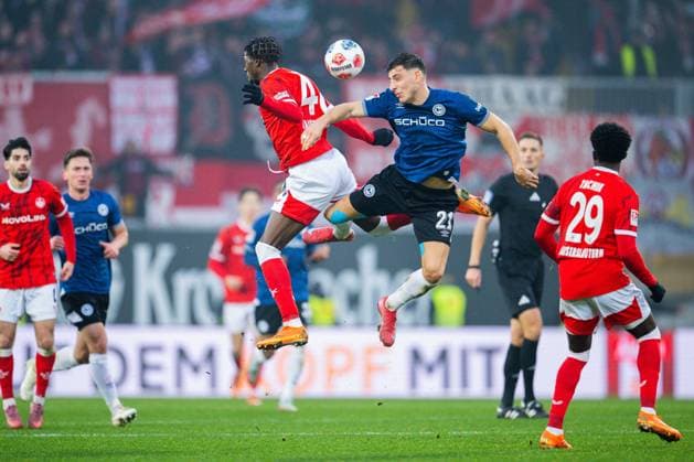 13 12 2025 Football, 2025 2026, 2 Bundesliga, Matchday 16, DSC Arminia Bielefeld 1 FC Kaiserslautern L R Faride Alidou Kaiserslautern , Stefano Russo Bielefeld DFL REGULATIONS PROHIBIT ANY USE OF PHOTOGRAPHS AS IMAGE SEQUENCES AND OR QUASI VIDEO