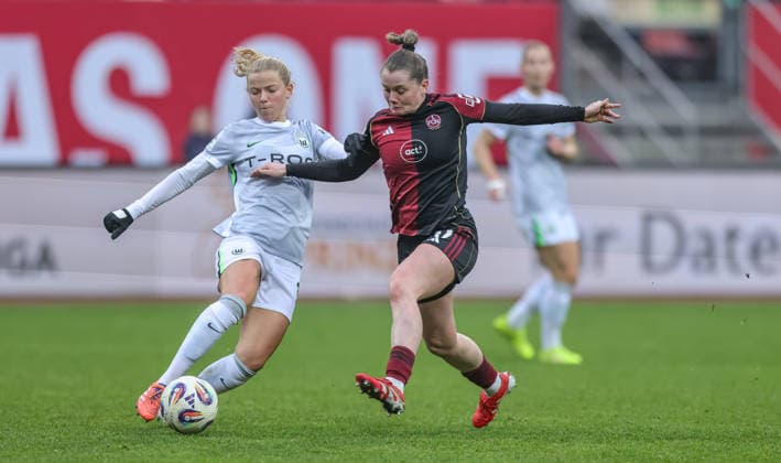 GER, Nuremberg, 1 FC Nuremberg vs VfL Wolfsburg, Google Pixel Bundesliga, Football, DFB, Season 2025 2026, Max Morlock Stadium, 13 Matchday in the picture from l Justine Kielland VfL Wolfsburg 18 , Jacqueline Baumgärtel 1 FC Nuremberg Women 20 , Duel DFB DFL REGULATIONS PROHIBIT ANY USE OF PHOTOGRAPHS AS IMAGE SEQUENCES AND OR QUASI VIDEO, 13 12 2025 Copyright: HMBxMedia HendrikxHamelau