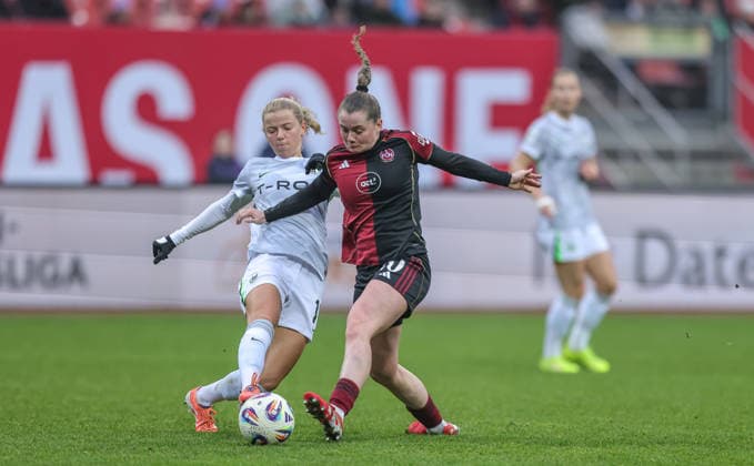 GER, Nuremberg, 1 FC Nuremberg vs VfL Wolfsburg, Google Pixel Bundesliga, Football, DFB, Season 2025 2026, Max Morlock Stadium, 13 Matchday in the picture from l Justine Kielland VfL Wolfsburg 18 , Jacqueline Baumgärtel 1 FC Nuremberg Women 20 , Duel DFB DFL REGULATIONS PROHIBIT ANY USE OF PHOTOGRAPHS AS IMAGE SEQUENCES AND OR QUASI VIDEO, 13 12 2025 Copyright: HMBxMedia HendrikxHamelau