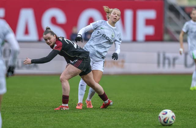 GER, Nuremberg, 1 FC Nuremberg vs VfL Wolfsburg, Google Pixel Bundesliga, Football, DFB, Season 2025 2026, Max Morlock Stadium, 13 Matchday in the picture from l Justine Kielland VfL Wolfsburg 18 , Jacqueline Baumgärtel 1 FC Nuremberg Women 20 , Duel DFB DFL REGULATIONS PROHIBIT ANY USE OF PHOTOGRAPHS AS IMAGE SEQUENCES AND OR QUASI VIDEO, 13 12 2025 Copyright: HMBxMedia HendrikxHamelau