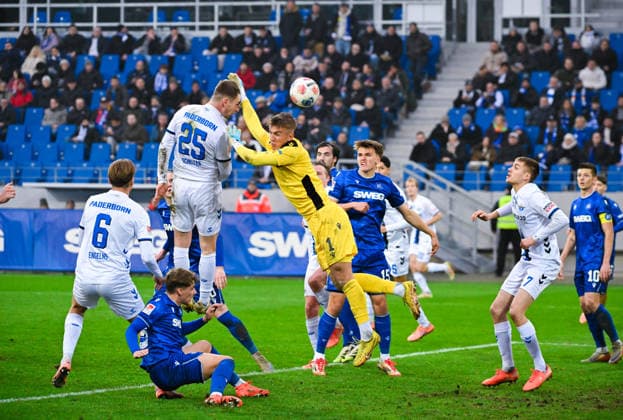 Tjark Scheller SC Paderborn scores his team s fourth goal with a header ball against Hans Christian Bernat Karlsruher SC during the 2 Bundesliga match between Karlsruher SC and SC Paderborn at BBBank Wildpark on December 13, 2025 in Karlsruhe, Germany, Germany Photo by Silas Schüller DeFodi Images Tjark Scheller SC Paderborn scores his team s fourth goal with a header ball against Hans Christian Bernat Karlsruher SC during the 2 Bundesliga match between Karlsruher SC and SC Paderborn at BBBank Wildpark on December 13, 2025 in Karlsruhe, Germany Photo by Silas Schüller DeFodi Images DFB DFL REGULATIONS PROHIBIT ANY USE OF PHOTOGRAPHS AS IMAGE SEQUENCES AND OR QUASI VIDEO Photo by Silas Schueller DeFodi Images