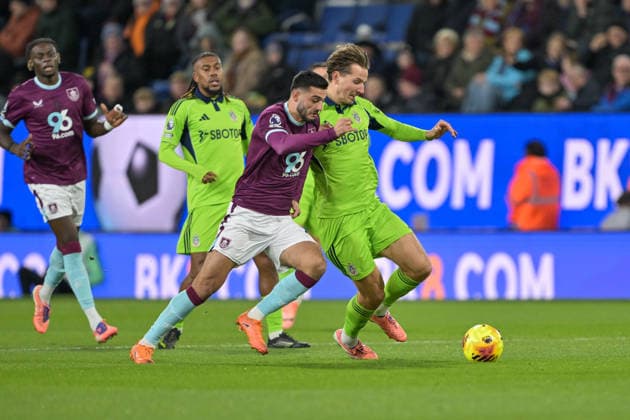 13th December 2025; Turf Moor, Burnley, Lancashire, England; Premier League Football, Burnley versus Fulham; Sander Berge of Fulham challenges Armando Broja of Burnley for the ball  LeexDurkin