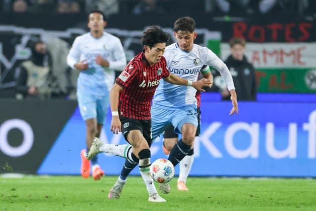 Hayate Matsuda Hannover 96 and Cajetan Lenz VfL Bochum battle for the ball, 2 Bundesliga, Hannover 96 v VfL Bochum, Heinz von Heiden Arena, December 13, 2025 in Hanover, Germany Photo by Marco Steinbrenner DeFodi Images Hayate Matsuda Hannover 96 and Cajetan Lenz VfL Bochum battle for the ball, 2 Bundesliga, Hannover 96 v VfL Bochum, Heinz von Heiden Arena, December 13, 2025 in Hanover, Germany Photo by Marco Steinbrenner DeFodi Images