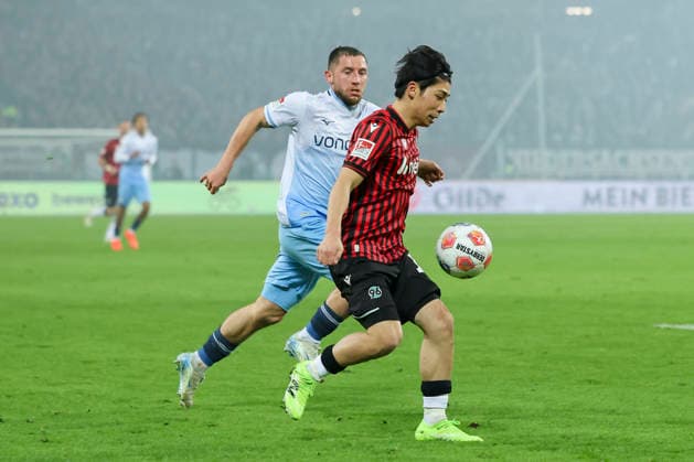 Maximilian Wittek VfL Bochum and Daisuke Yokota Hannover 96 battle for the ball, 2 Bundesliga, Hannover 96 v VfL Bochum, Heinz von Heiden Arena on December 13, 2025 in Hannover, Germany Photo by Marco Steinbrenner DeFodi Images Maximilian Wittek VfL Bochum and Daisuke Yokota Hannover 96 battle for the ball, 2 Bundesliga, Hannover 96 v VfL Bochum, Heinz von Heiden Arena, December 13, 2025 in Hanover, Germany Photo by Marco Steinbrenner DeFodi Images