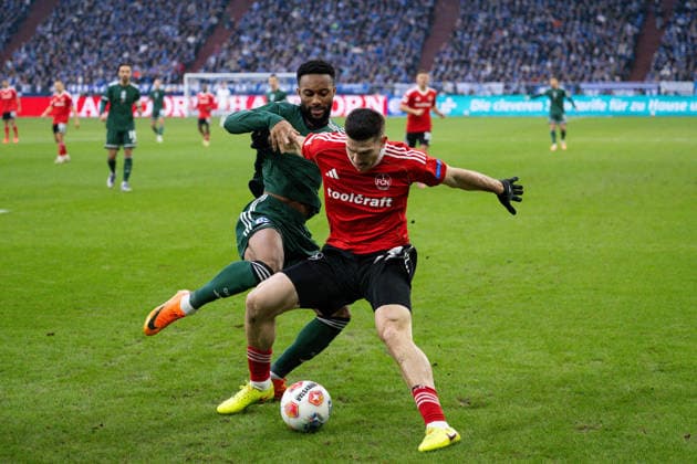14 12 2025, Football, 2 Bundesliga, Season 2025 2026, Matchday 16, FC Schalke 04 1 FC Nürnberg, Moussa Sylla FC Schalke 04 , Luka Lochoshvili 1 FC Nürnberg xRHR PHOTO YYx Copyright: KROEGER RHR-FOTOx RHR-FOTO YY