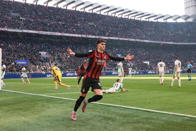 Milan, Italy, 14th December 2025. Davide Bartesaghi of AC Milan celebrates after scoring his second goal to give the hosts a 2-1 lead during the AC Milan vs Sassuolo Serie A match at Giuseppe Meazza, Milan. Picture credit should read: Jonathan Moscrop Sportimage EDITORIAL USE ONLY. No use with unauthorised audio, video, data, fixture lists, club league logos or live services. Online in-match use limited to 120 images, no video emulation. No use in betting, games or single club league player publications. SPI_016_JM_MILAN_SASSUOLO SPI-4363-0016