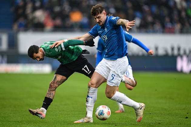 Oliver Batista Meier Muenster 17 in duel with Matej Maglica SV Darmstadt 1898, 05 , GER, SV Darmstadt 98 vs Preußen Münster, Football, 2 Bundesliga, Matchday 16, Season 2025 2026, 14 12 2025 DFL REGULATIONS PROHIBIT ANY USE OF PHOTOGRAPHS AS IMAGE SEQUENCES AND OR QUASI VIDEO GER, SV Darmstadt 98 vs Preußen Münster, Football, 2 Bundesliga, Matchday 16, Season 2025 2026, 14 12 2025 Darmstadt Copyright: xEibner-Pressefoto FlorianxWiegandx EP_FWD