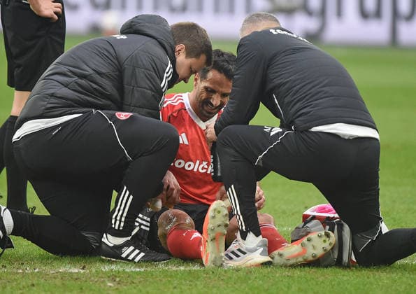 14 12 2025, xhbx, Soccer 2 Bundesliga, FC Schalke 04 1 FC Nürnberg v l Adriano Grimaldi 1 FC Nuernberg injured, injury, DFL DFB REGULATIONS PROHIBIT ANY USE OF PHOTOGRAPHS as IMAGE SEQUENCES and or QUASI VIDEO Gelsenkirchen