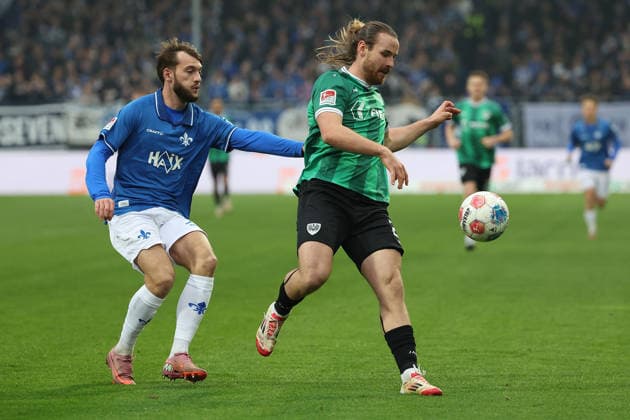 2025 12 14 xjfx 2 Bundesliga SV Darmstadt 98 SC Preussen Muenster v l , Kilian Julian Corredor SV Darmstadt 98 , Jannis Heuer Preussen Muenster DFL DFB REGULATIONS PROHIBIT ANY USE OF PHOTOGRAPHS as IMAGE SEQUENCES and or QUASI VIDEO Copyright: JoaquimxFerreira