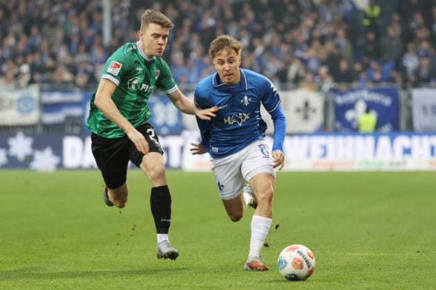 14 12 2025, xtvx, Fußball 2 Bundesliga, SV Darmstadt 98 Preußen Münster v l Zweikampf, Duell, duel, tackle, compete Jano ter Horst Preussen Muenster Luca Marseiler SV Darmstadt 98 DFL DFB REGULATIONS PROHIBIT ANY USE OF PHOTOGRAPHS as IMAGE SEQUENCES and or QUASI VIDEO Darmstadt