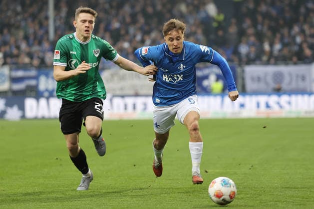 14 12 2025, xtvx, Fußball 2 Bundesliga, SV Darmstadt 98 Preußen Münster v l Zweikampf, Duell, duel, tackle, compete Jano ter Horst Preussen Muenster Luca Marseiler SV Darmstadt 98 DFL DFB REGULATIONS PROHIBIT ANY USE OF PHOTOGRAPHS as IMAGE SEQUENCES and or QUASI VIDEO Darmstadt