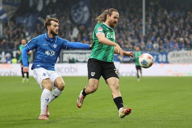14 12 2025, xtvx, Fußball 2 Bundesliga, SV Darmstadt 98 Preußen Münster v l Zweikampf, Duell, duel, tackle, compete Killian Corredor SV Darmstadt 98 Jannis Heuer Preussen Muenster DFL DFB REGULATIONS PROHIBIT ANY USE OF PHOTOGRAPHS as IMAGE SEQUENCES and or QUASI VIDEO Darmstadt
