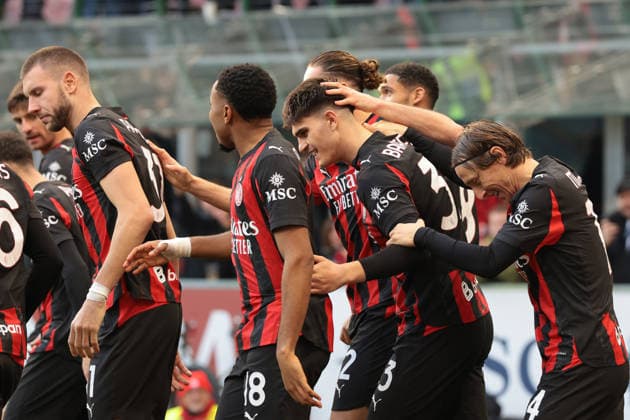 Milan, Italy, 14th December 2025. Davide Bartesaghi of AC Milan celebrates after scoring his second goal to give the hosts a 2-1 lead during the AC Milan vs Sassuolo Serie A match at Giuseppe Meazza, Milan. Picture credit should read: Jonathan Moscrop Sportimage EDITORIAL USE ONLY. No use with unauthorised audio, video, data, fixture lists, club league logos or live services. Online in-match use limited to 120 images, no video emulation. No use in betting, games or single club league player publications. SPI_026_JM_MILAN_SASSUOLO SPI-4363-0026