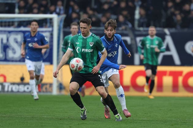 2025 12 14 xjfx 2 Bundesliga SV Darmstadt 98 SC Preussen Muenster v l , Paul Jaeckel Preussen Muenster , Kilian Julian Corredor SV Darmstadt 98 Zweikampf, Action, Aktion, Battles for the Ball DFL DFB REGULATIONS PROHIBIT ANY USE OF PHOTOGRAPHS as IMAGE SEQUENCES and or QUASI VIDEO Copyright: JoaquimxFerreira
