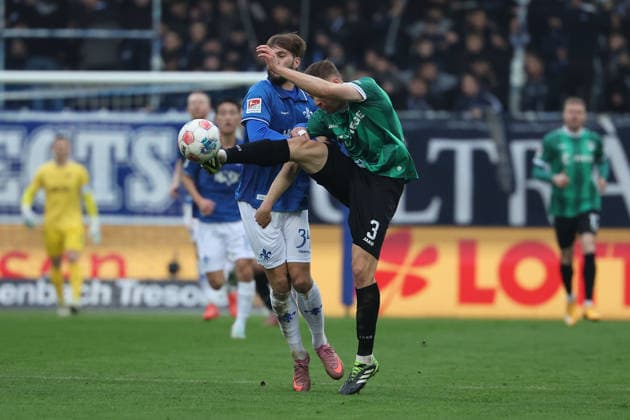 2025 12 14 xjfx 2 Bundesliga SV Darmstadt 98 SC Preussen Muenster v l , Kilian Julian Corredor SV Darmstadt 98 , Paul Jaeckel Preussen Muenster , Zweikampf, Action, Aktion, Battles for the Ball DFL DFB REGULATIONS PROHIBIT ANY USE OF PHOTOGRAPHS as IMAGE SEQUENCES and or QUASI VIDEO Copyright: JoaquimxFerreira