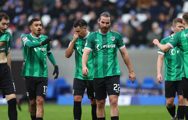 14 12 2025, Soccer 2 Bundesliga, SV Darmstadt 98 SC Preußen Münster, emonline, emspor, despor, v l , Oliver Batista Meier SC Preußen Münster , Yassine Bouchama SC Preußen Münster , Jannis Heuer SC Preußen Münster disappointed, disappointed looking, dissapointed, sad, frustrated, frustrated, frustrated DFL DFB REGULATIONS PROHIBIT ANY USE OF PHOTOGRAPHS AS IMAGE SEQUENCES AND OR QUASI VIDEO xdcx Copyright: HMBxMedia Claus