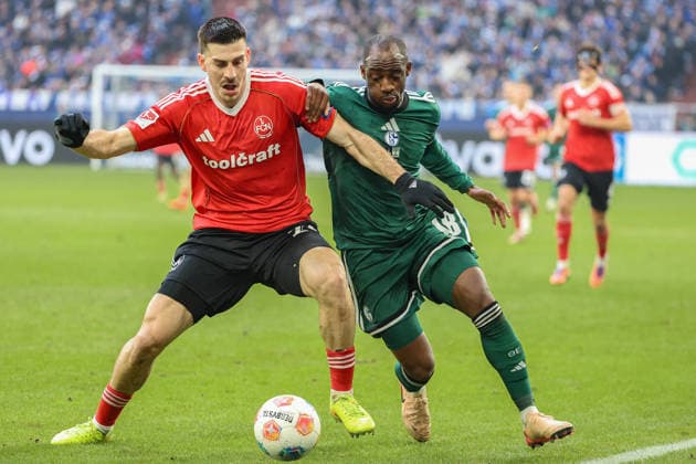 2 Bundesliga FC Schalke 04 1 FC Nürnberg on 14 12 2025 at the Veltins Arena in Schalke Luka Lochoshvili Nuernberg 24 vs Christopher Antwi Adjei Schalke 18 MH