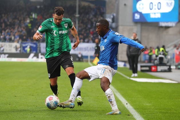14 12 2025, xtvx, Fußball 2 Bundesliga, SV Darmstadt 98 Preußen Münster v l Zweikampf, Duell, duel, tackle, compete Yassine Bouchama Preussen Muenster Merveille Papela SV Darmstadt 98 DFL DFB REGULATIONS PROHIBIT ANY USE OF PHOTOGRAPHS as IMAGE SEQUENCES and or QUASI VIDEO Darmstadt