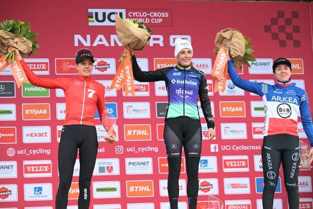 Dutch Aniek Van Alphen, Dutch Lucinda Brand and French Amandine Fouquenet celebrate on the podium after the women s elite race of the Cyclocross World Cup, in Namur, Sunday 14 December 2025, stage 4 (out of 12) in the World Cup of the 2026-2027 season. DAVIDxPINTENS  x148826964x