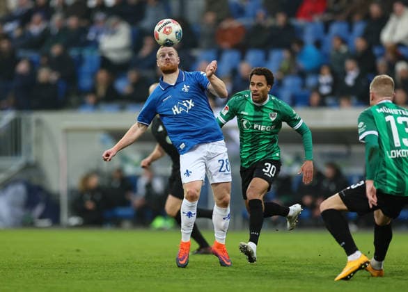 14 12 2025, Football 2 Bundesliga, SV Darmstadt 98 SC Preußen Münster, emonline, emspor, despor, v l , Paul Will SV Darmstadt 98 , Etienne Amenyido SC Preußen Münster DFL DFB REGULATIONS PROHIBIT ANY USE OF PHOTOGRAPHS AS IMAGE SEQUENCES AND OR QUASI VIDEO xdcx Copyright: HMBxMedia Claus