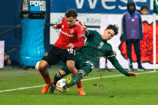 Germany 2 Bundesliga 2025 26, 14 Matchday FC Schalke 04 vs 1 FC Nuremberg 14 12 2025 Veltins Arena Gelsenkirchen, North Rhine-Westphalia Rafael Lubach 1 FC Nuremberg, 18 Nikola Katic Schalke 04, 25 Copyright: xCelinaxLeiersx