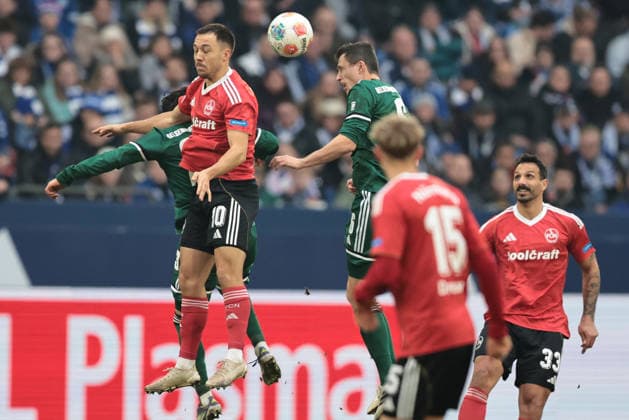 Julian Justvan 1 FC Nuremberg and Ron Schallenberg FC Schalke 04 at the match of the 2 Bundesliga season 2025 26 FC Schalke 04 1 FC Nuremberg Copyright Thomas Pakusch