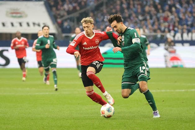 Tim Drexler 1 FC Nuremberg and Kenan Karaman FC Schalke 04 at the match of the 2 Bundesliga season 2025 26 FC Schalke 04 1 FC Nuremberg Copyright Thomas Pakusch