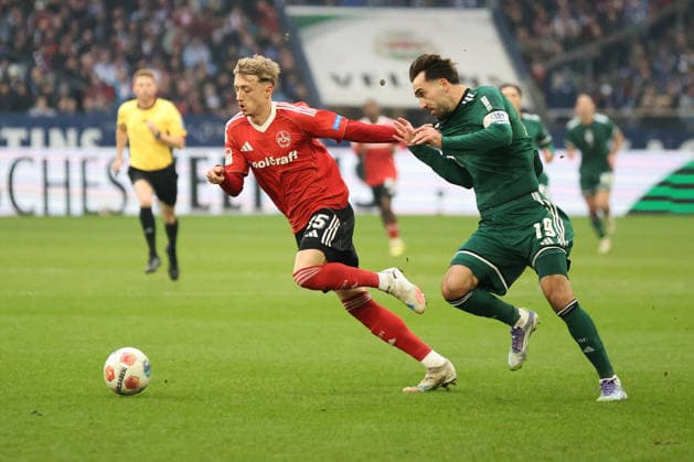 Tim Drexler 1 FC Nuremberg and Kenan Karaman FC Schalke 04 at the match of the 2 Bundesliga season 2025 26 FC Schalke 04 1 FC Nuremberg Copyright Thomas Pakusch