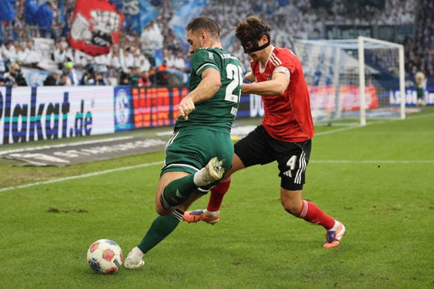 Nikola Katic FC Schalke 04 and Fabio Gruber 1 FC Nürnberg at the match of the 2 Bundesliga season 2025 26 FC Schalke 04 1 FC Nürnberg Copyright Thomas Pakusch