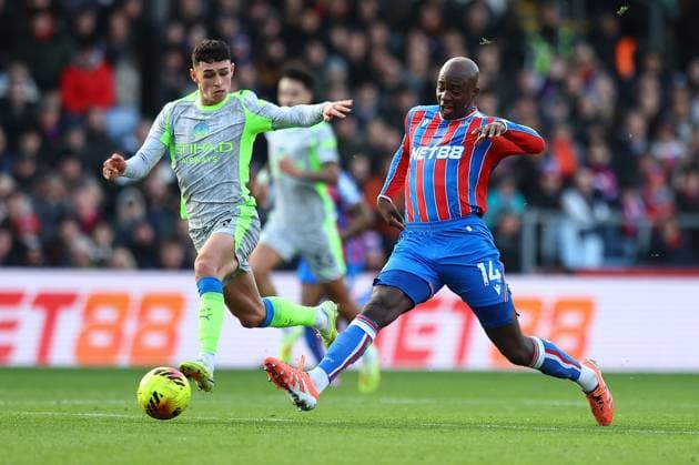 Jean-Philippe Mateta of Crystal Palace and Phil Foden of Manchester City Crystal Palace v Manchester City, Premier League, Football, Selhurst Park, London, UK - 14 Dec 2025London Selhurst Park United Kingdom EDITORIAL USE ONLY No use with unauthorised audio, video, data, fixture lists, club league logos or live services. Online in-match use limited to 120 images, no video emulation. No use in betting, games or single club league player publications. Copyright: xMichaelxZemanek Shutterstockx 16081573x