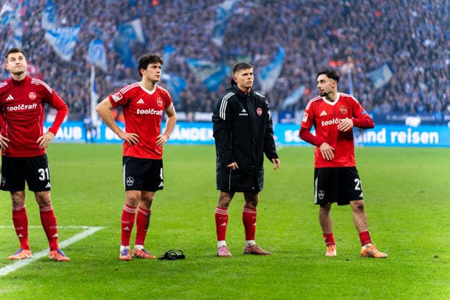 Germany 2 Bundesliga 2025 26, 14 Matchday FC Schalke 04 vs 1 FC Nürnberg 14 12 2025 Veltins Arena Gelsenkirchen, North Rhine-Westphalia Fabio Gruber 1 FC Nürnberg, 4 Robin Knoche 1 FC Nürnberg, 31 Berkay Yilmaz 1 FC Nürnberg, 21 Copyright: xCelinaxLeiersx