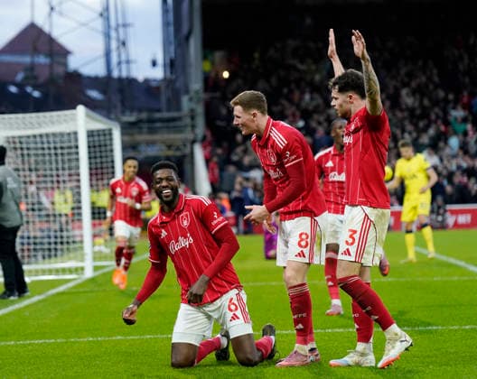 Nottingham, England, 14th December 2025. Ibrahim Sangare of Nottingham Forest celebrates scoring their third goalduring the Nottingham Forest vs Tottenham Hotspur Premier League match at the City Ground, Nottingham. Picture credit should read: Andrew Yates Sportimage EDITORIAL USE ONLY. No use with unauthorised audio, video, data, fixture lists, club league logos or live services. Online in-match use limited to 120 images, no video emulation. No use in betting, games or single club league player publications. SPI_074_AY_Forest_Spurs SPI-4376-0074