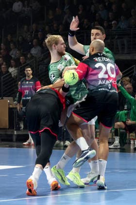 DEU, DHB, 1 HBL, Fuechse Berlin vs Wetzlar, 14 12 2025, Max Schmeling Halle, Berlin, DEU, DHB, 1 HBL, Fuechse Berlin vs Wetzlar, in the picture Matthes Langhoff Fuechse Berlin 25 , Mijajlo Marsenic Fuechse Berlin 93 , Nikola Grahovac HSG Wetzlar 2 , David Cyrill Akakpo HSG Wetzlar 20 nordphotoxGmbHx xEngler nph00076