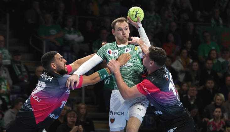 Philipp Ahouansou, Mathias Gidsel on the ball, Josip Simic duel Game scene Action Sport Handball HBL Bundesliga Men 17 Matchday Season 2025 2026 14 12 2025 Füchse Berlin vs HSG Wetzlar