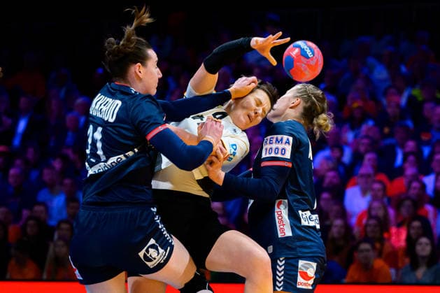 Handball, Womens World Championship, Final Germany Norway from left in a duel Ingvild Bakkerud Norway and Alina Grijseels Germany , Maren Aardahl Norway Rotterdam Ahoy Arena Netherlands