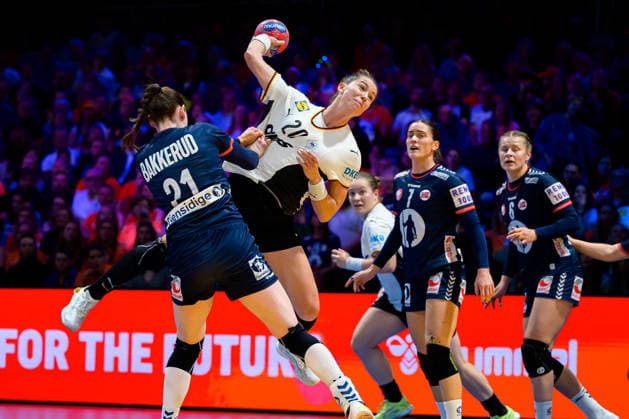 Handball, Womens World Championship, Final Germany Norway from left in a duel Ingvild Bakkerud Norway and Emily Vogel Germany , Stine Skogrand Norway Rotterdam Ahoy Arena Netherlands