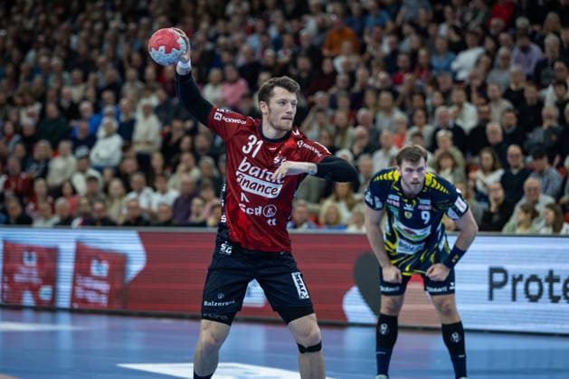 DAIKIN HBL SG Flensburg Handewitt vs Rhein Neckar Löwen 14 12 25 Emil Jakobsen No 31, SG Flensburg Handewitt in attack DAIKIN HBL SG Flensburg Handewitt vs Rhein Neckar Löwen, GP JOULE Arena on 14 12 25 Copyright: xBEAUTIFULxSPORTS MarioxM.xKobergx