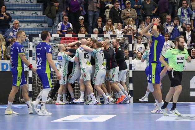 14 12 2025, xtgx, VfL Gummersbach SC Magdeburg v l Magdeburg cheering about the victory, cheering after the game, Gummersbach disappointed, looks disappointed, dejected, disappointed Gummersbach