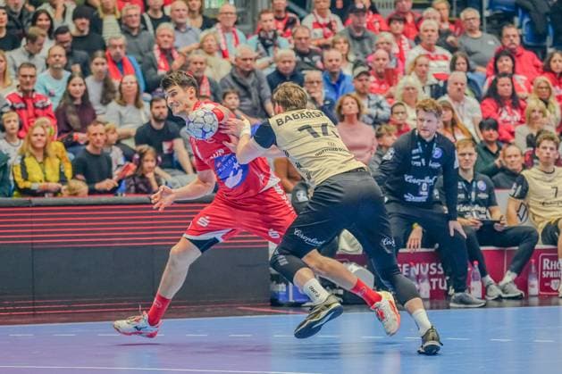 Scene with Dainis Kriötop ns 10 MT Melsungen and 17 Bergischer HC Dainis Kriötop ns 10 MT Melsungen and 17 Bergischer HC in a duel Copyright: xMichaelxSchäferx