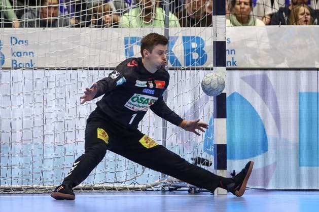 14 12 2025, xtgx, VfL Gummersbach SC Magdeburg v l Sergey Hernandez Ferrer Magdeburg, 1 save, holds the ball, catches the ball, parries Gummersbach