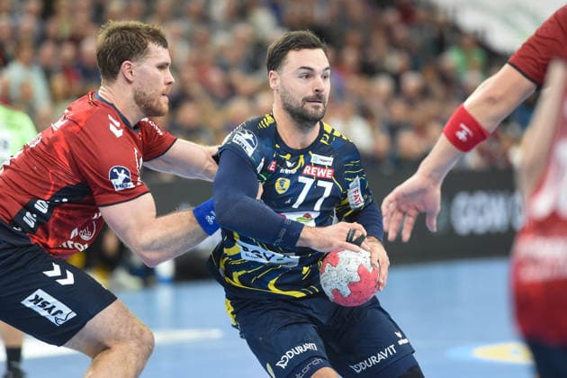Handball I Men I Season 2025 2026 I Bundesliga I 17 Matchday I SG Flensburg Handewitt Rhein Neckar Löwen I 14 12 2025 from left Johannes Golla 4, SG Flensburg Handewitt , Dani Baijens 77, Rhein Neckar Löwen Copyright: xLobeca JanxKirschnerx