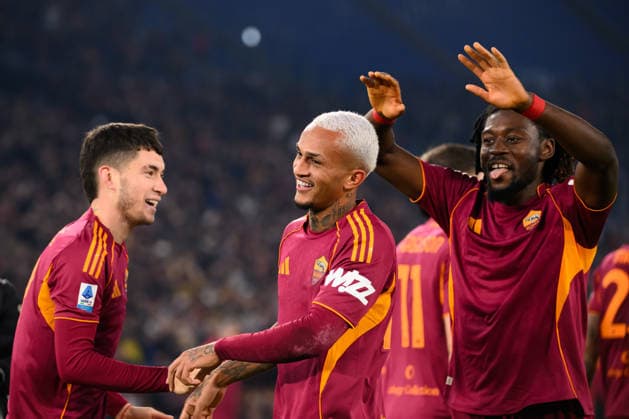 Wesley Vinicius Franca Lima of AS Roma celebrates with Matias Soule (l) and Manu Kone (r) after scoring the goal of 1-0 during the Serie A 2025 2026 football match between AS Roma and Como 1907 at Stadio Olimpico in Rome (Italy), December 15, 2025. AntoniettaxBaldassarre