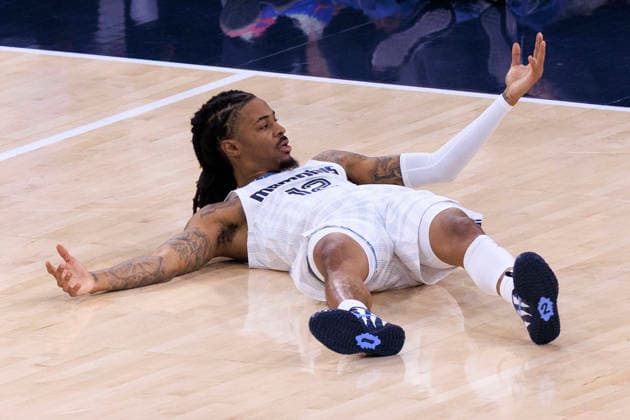 December 15, 2025, Inglewood, California, USA: Ja Morant 12 of the Memphis Grizzlies looks for a foul call after falling during their regular season NBA, Basketball Herren, USA game against the Los Angeles Clippers on Monday December 15, 2025 at Intuit Dome in Inglewood, California. ARIANA RUIZ PI Inglewood USA - ZUMAp124 20251215_zaa_p124_047 Copyright: xArianaxRuizx