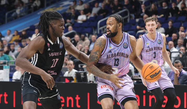 Jean Marc Pansa, J Wan Roberts on the ball duel Match scene Action Sport Basketball Champions League CL Men Season 2025 2026 16 12 2025 ALBA Berlin vs BC Sabah Baku
