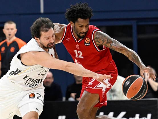 December 16, 2025, Milano: Real Madrid™s Sergio Llull (L) and struggle for the ball during the Euroleague basketball match between EA7 Emporio Armani and Real Madrid in Milan. ANSA DANIEL DAL ZENNARO. Basket: EA7 Milano Bene In Eurolega, Batte Il Real Madrid 89-82  - ZUMAa110 20251216_zaf_a110_016 Copyright: xDanielxDalxZennarox