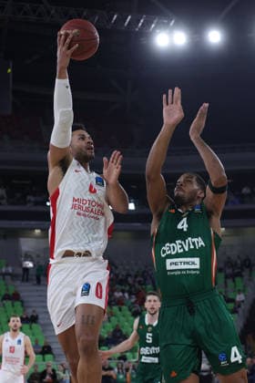 (251217) -- LJUBLJANA, Dec. 17, 2025 -- Justin Smith (L) of Hapoel Midtown Jerusalem goes for a layup during the BKT EuroCup 2025 26 11th round basketball match between Cedevita Olimpija Ljubljana and Hapoel Midtown Jerusalem in Ljubljana, Slovenia, on Dec. 16, 2025. (Photo by Xinhua) (SP) SLOVENIA-LJUBLJANA-BASKETBALL-BKT EUROCUP-CEDEVITA OLIMPIJA LJUBLJANA VS HAPOEL VIDTOWN JERUSALEM ZeljkoxStevanic 