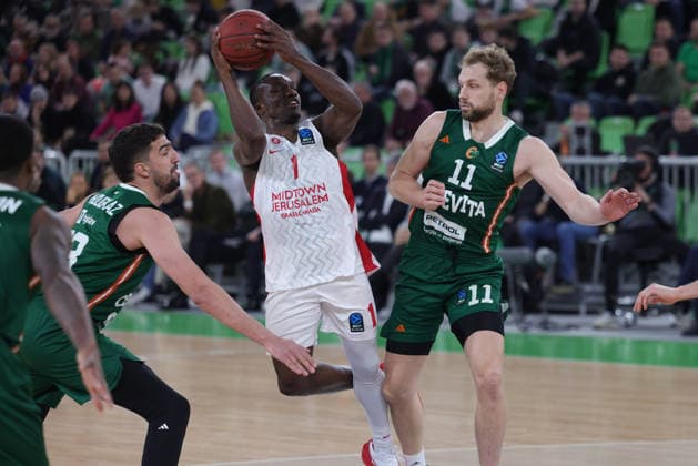 (251217) -- LJUBLJANA, Dec. 17, 2025 -- Jared Harper (2nd R) of Hapoel Midtown Jerusalem competes during the BKT EuroCup 2025 26 11th round basketball match between Cedevita Olimpija Ljubljana and Hapoel Midtown Jerusalem in Ljubljana, Slovenia, on Dec. 16, 2025. (Photo by Xinhua) (SP) SLOVENIA-LJUBLJANA-BASKETBALL-BKT EUROCUP-CEDEVITA OLIMPIJA LJUBLJANA VS HAPOEL VIDTOWN JERUSALEM ZeljkoxStevanic 